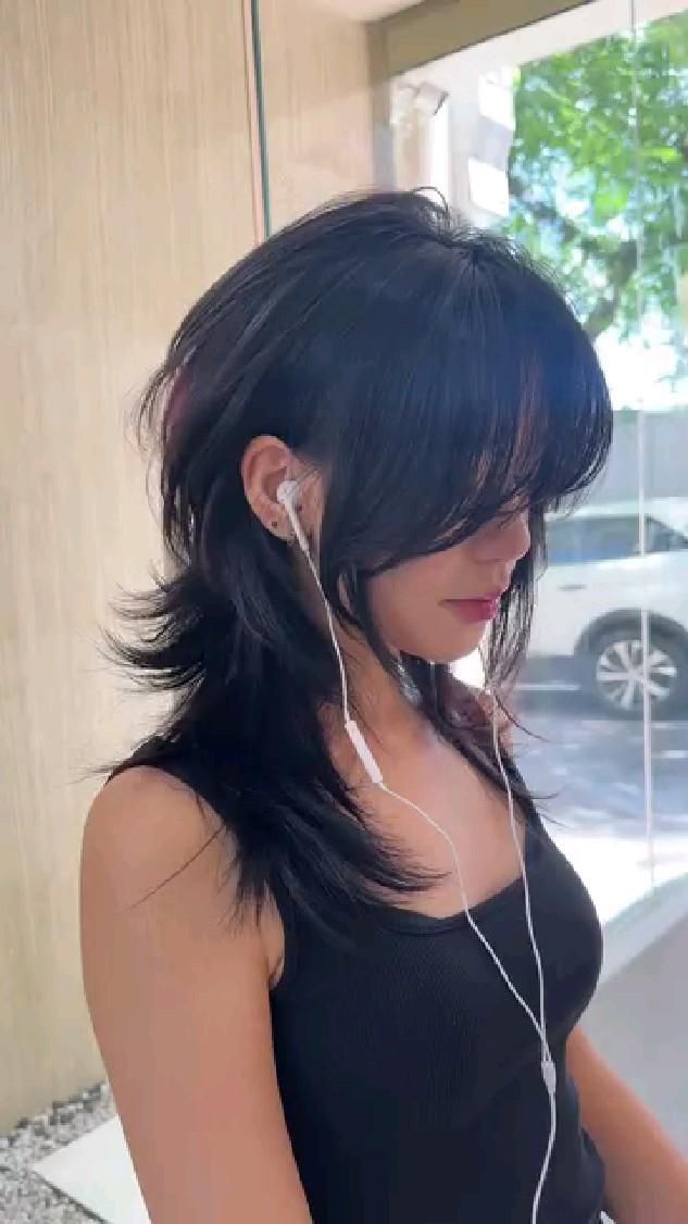 Coupe wolf cut femme